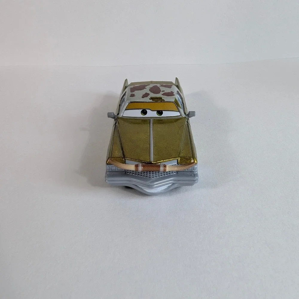 Disney Pixar Cars Tex Dinoco Gold Cadillac Diecast Toy Car Longhorns Mattel